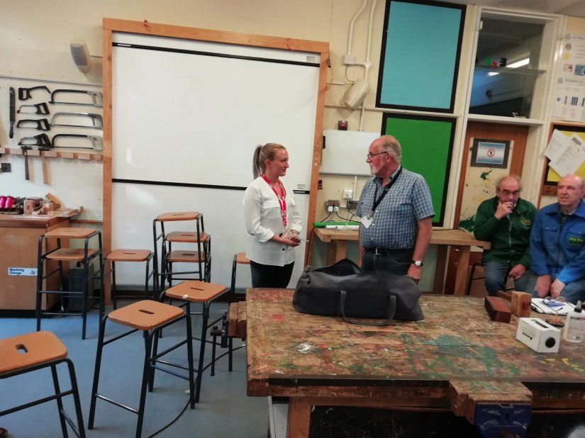 Robert presenting a cheque £588.18 to Charlie from west-midlands air ambulance our charity for last year.